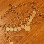 Coins And Metal Circle Head Piece