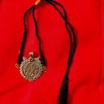 Round Golden Coin and Black Cord Choker
